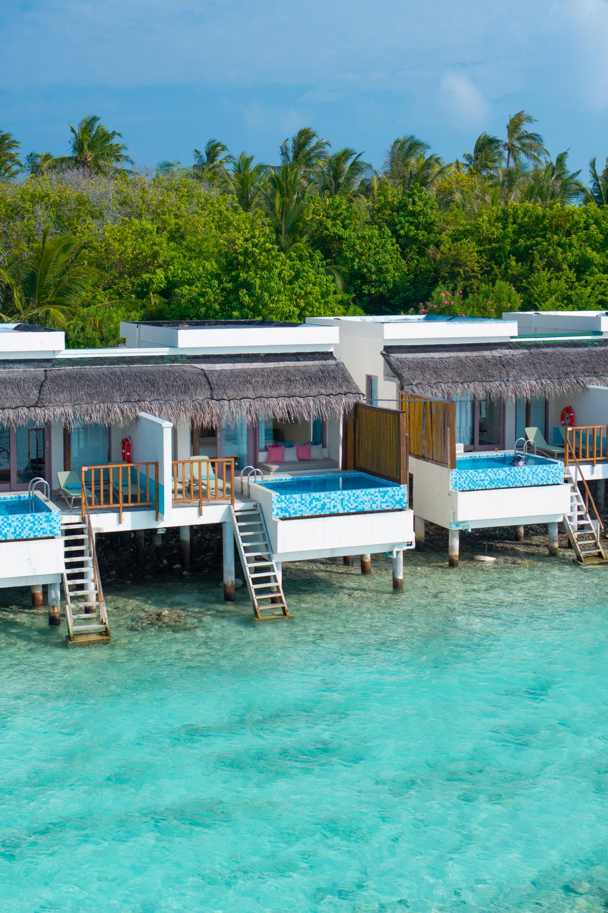 Lagoon villas over the turquoise lagoon