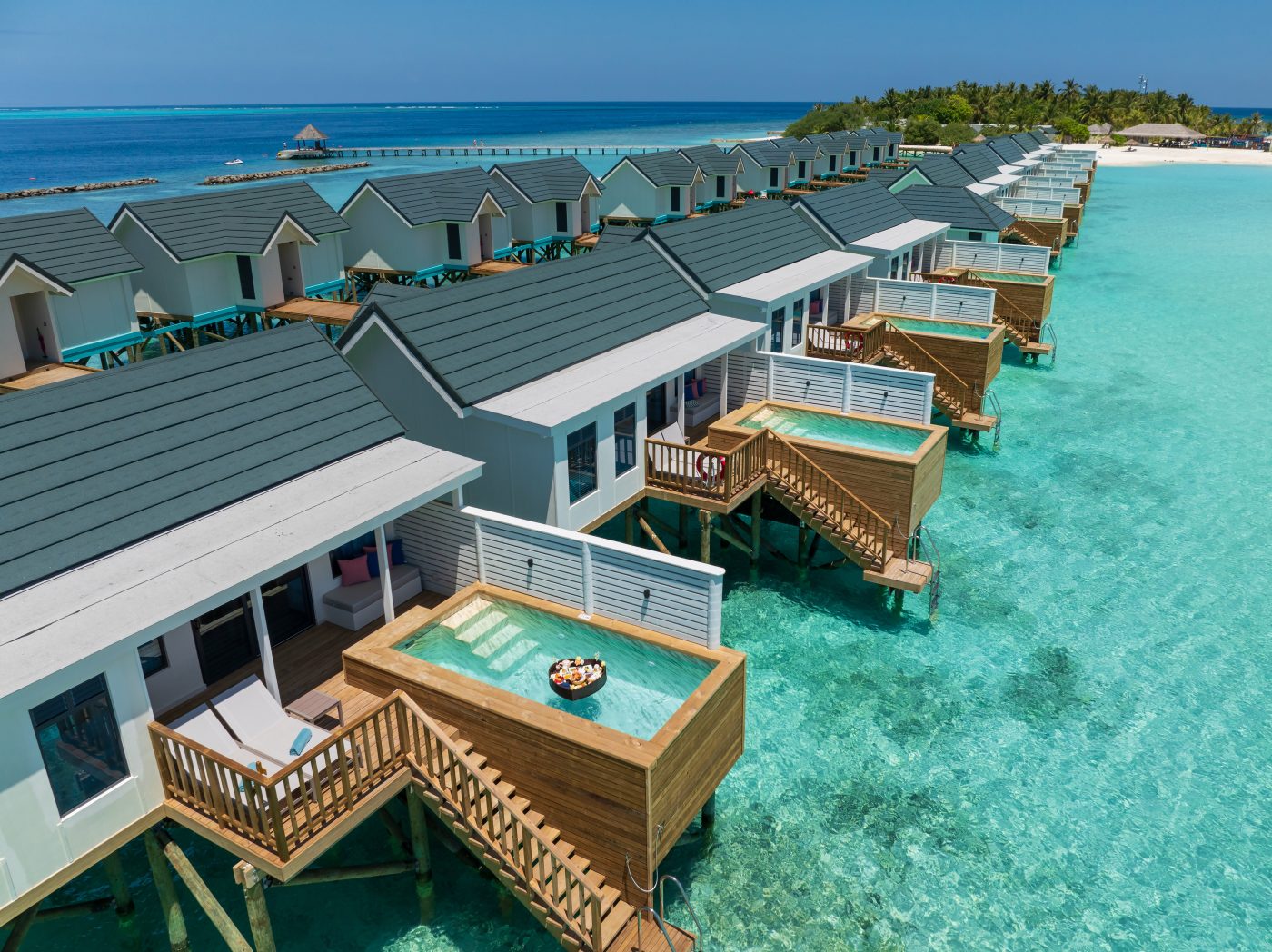 Water villas with pools from the air at Helengeli